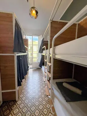 a hallway with bunk beds in a room at Fabrizzio's Petit in Barcelona
