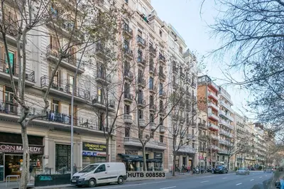 a white van parked in front of a building at Alcam Berlin-Numancia in Barcelona
