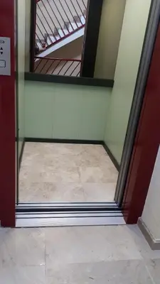 a room with a glass door and a tile floor at Casa Ana -Cubelles in Cubelles