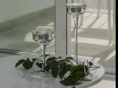 a table with two glasses and a plant on it at Sitges Spaces Sea View Paradise- 2 Bedrooms, 2 Bathrooms, Terrace, Amazing Sea Views in Sitges