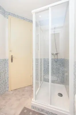 a kitchen with a sink and a dishwasher at Stay Barcelona Plaza España Fira in Barcelona