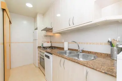 a kitchen with a sink and a counter top at Cadillac Check-in flexible-Bien comunicado-cerca Barcelona in Cornellà de Llobregat