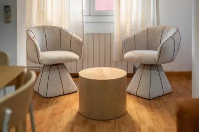 two chairs and a table in a room at Stay U-nique Apartments Salva II in Barcelona