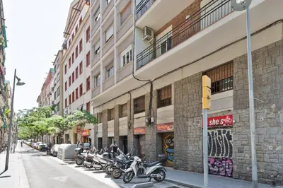 a row of motorcycles parked in front of a building at Stay U-nique Apartments Salva II in Barcelona