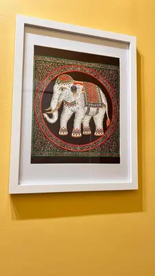 a framed picture of two elephants on a wall at New Camp Nou Apartment/Diret Airport,Beautiful in Hospitalet de Llobregat