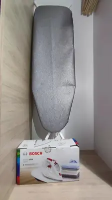 a chair sitting on top of a box with a book at New Camp Nou Apartment/Diret Airport,Beautiful in Hospitalet de Llobregat
