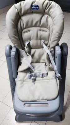 a baby car seat sitting on top of a floor at New Camp Nou Apartment/Diret Airport,Beautiful in Hospitalet de Llobregat