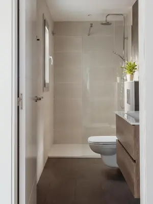 a bathroom with a toilet and a shower and a sink at Apartamentos Espai Progres by Be Barcelona in Hospitalet de Llobregat