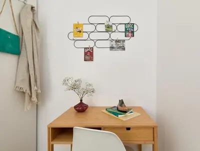 a room with a wooden table and a chair at Casa Cosi - El Farro 3 in Barcelona