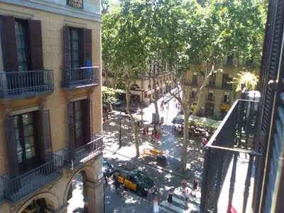 a view of a city street from a building at Colom Apartments in Barcelona