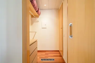 a small room with a closet and a hallway at Alcam Anglesola in Barcelona