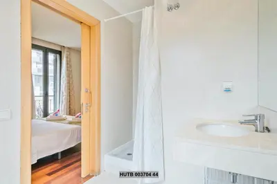 a bathroom with a sink and a mirror at Alcam Anglesola in Barcelona