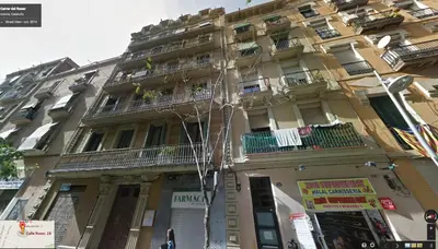 a large building with balconies on the side of it at Alcam Molino in Barcelona