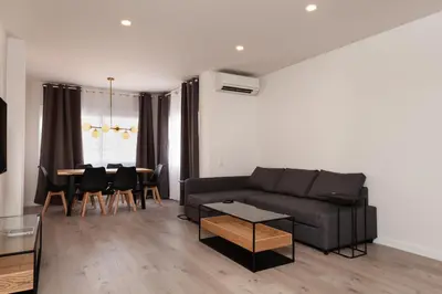 a living room with a couch and a table at Rambla Catalunya 8 in Barcelona