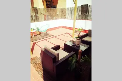 an aerial view of a patio with chairs and tables at M4 Cool Terrace. 1 min to metro. 15 min to center in Esplugues de Llobregat