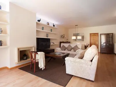 a living room with a couch and a table at Click&Flat Luxury mistral in Barcelona