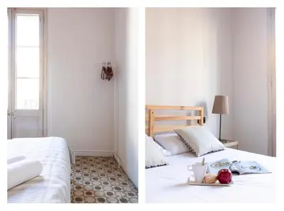 a bedroom with a bed with a plate of fruit on it at 1814 - AB Sagrada Família Cartagena in Barcelona