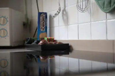 a kitchen counter with a tray of utensils on it at Seneca7 near paseo de gracia in Barcelona