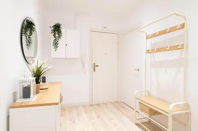 a kitchen with white walls and a white door at Apartamento NUEVO con encanto en SAGRADA FAMILIA in Barcelona