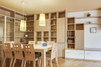 a kitchen and dining room with a table and chairs at Stay U-nique Apartments Diagonal Mar in Barcelona