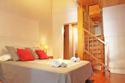 a bedroom with a bed with towels on it at Urban Loft Barcelona Diagonal super ubicación wifi in Barcelona