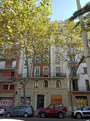 a building with cars parked in front of it at Urban Loft Barcelona Diagonal super ubicación wifi in Barcelona
