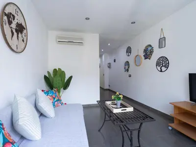 a living room with a couch and a table at Matarolux20 in Mataró