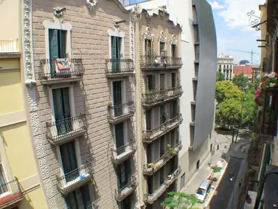 a tall building with balconies on the side of it at Barcelona4Seasons - Gavina in Barcelona