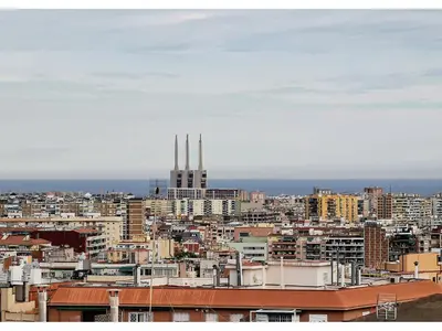a view of a city with tall buildings at ClassBedroom Gaudí Apartments in Barcelona