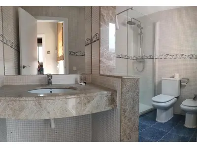 a bathroom with a sink and a toilet at ClassBedroom Gaudí Apartments in Barcelona