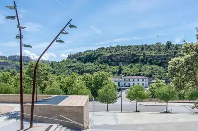 a group of lights on a pole in a parking lot at Apartamento Arbones de Manresa in Manresa