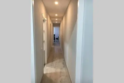 an empty hallway with a hallway leading to a room at sagrada familia gaudi in Barcelona