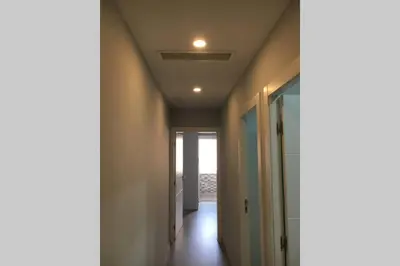 a hallway with a ceiling with a light on it at sagrada familia gaudi in Barcelona