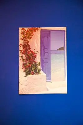 a painting of a door to the beach at Apartamento Rosellón in Barcelona
