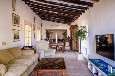 a living room with a couch and a table at Lidia's Rural House (HUTB-0615) in Barcelona