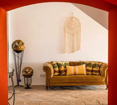 a living room with a couch and two lamps at Lidia's Rural House (HUTB-0615) in Barcelona