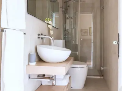 a bathroom with a sink and a toilet at Period Luxury Apartment in Barcelona Prime Location with Street View in Barcelona