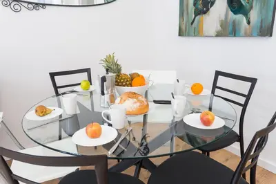 a glass table with fruit on top of it at Sagrada Familia Butterfly in Barcelona