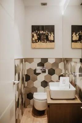 a bathroom with a toilet and a sink at Petit Luxe St. Pere in Terrassa