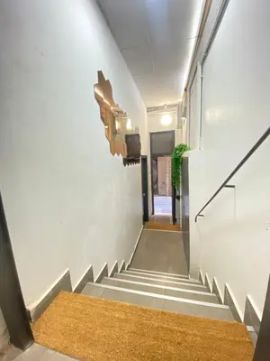 a staircase in a building with a stair case at 028 Apartament 2 2 in Barcelona