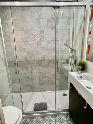 a bathroom with a shower and a sink at Sea Dreams with Amazing Terrace in Sitges