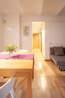 a living room with a bed and a couch at Apartamento zona Sagrada Familia in Barcelona