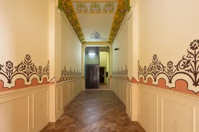 a hallway in a building with an ornate ceiling at Casa Cosi - Francoli 4 in Barcelona