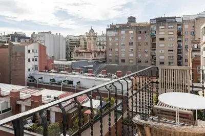 a view of a city from a balcony at Casa Cosi - El Farro 1 in Barcelona