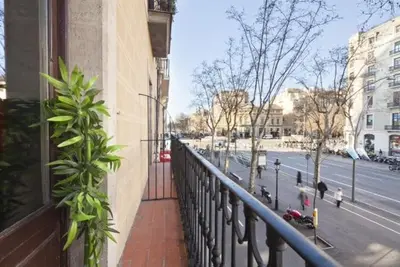 a balcony of a building with a view of a street at Paseo de Gracia Apartments in Barcelona