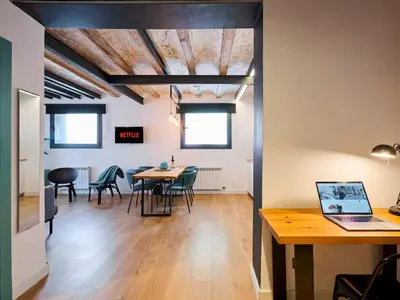 a dining room with a table and chairs at Casa Wilson by MyRentalHost in Barcelona
