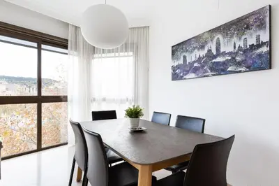 a dining room with a table and chairs at Stay U-nique Apartments Sant Antoni II in Barcelona