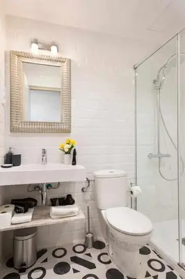 a bathroom with a toilet and a sink and a shower at Apartment Eduardo in Barcelona