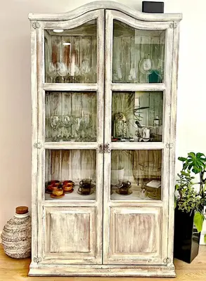 an old wooden cabinet with glass doors at Abbott apartment - 1 min from the beach - 100m2 - sleeps 8 in Sitges
