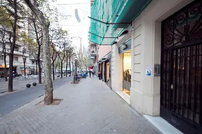 a cobblestone street in front of a building at Stay U-nique Apartments Gaudi II in Barcelona